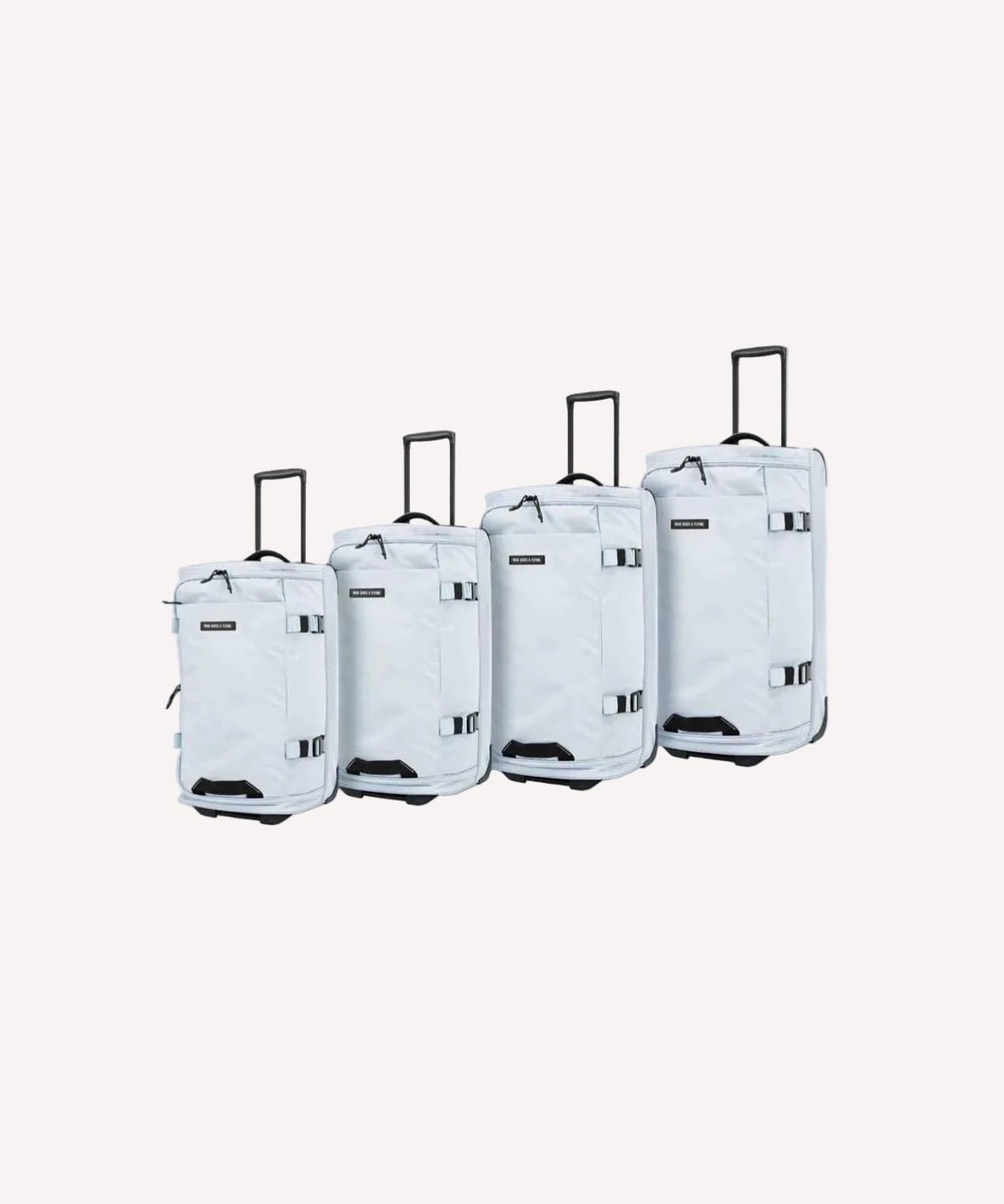 4 piece soft shell luggage set in Sky with GPS tracker — Who Gives A Flying Australia
