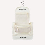 Oat travel toiletry bag open showing organisation — Who Gives A Flying Australia