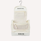 Oat travel toiletry bag open showing organisation — Who Gives A Flying Australia